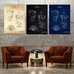 Trois affiches techniques illustrent la structure de l'appareil respiratoire, avec des variations de couleurs et de détails, complétées par deux fauteuils en cuir marron et une table basse de style industriel, créant un environnement élégant et sophistiqué.