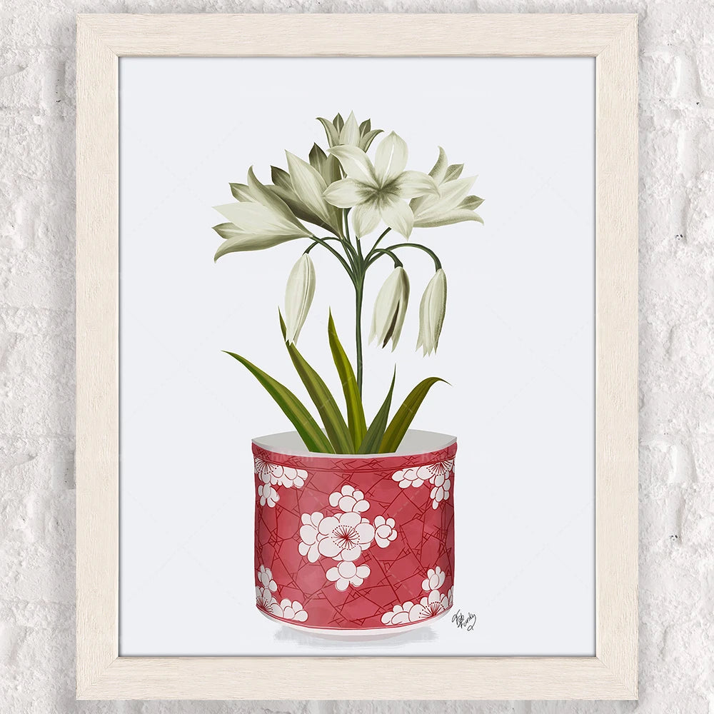 Un bouquet de fleurs blanches élégantes dans un pot décoratif rouge avec des motifs floraux.