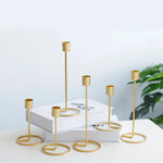 supports bougie or modernes hauteur 15cm 25cm lisses motifs torsadés bougies blanches dorées composition