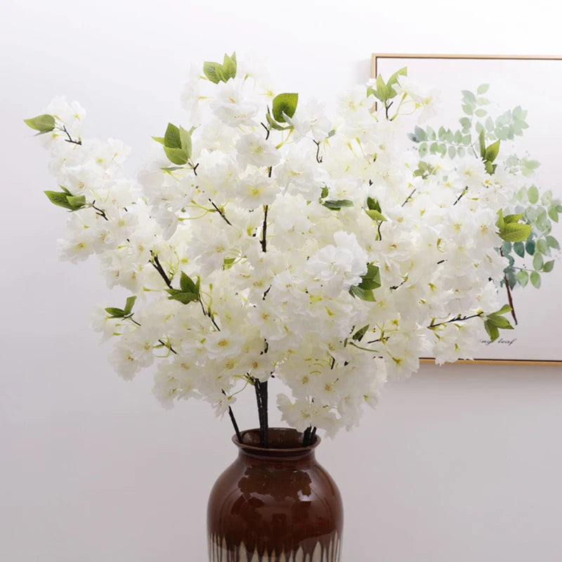 Décoration de mariage avec branches de cerisier artificielles