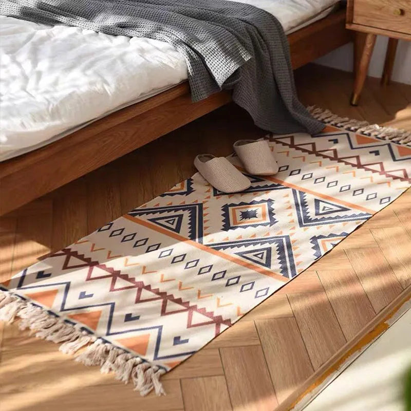 tapis boho chic motifs géométriques beige bleu orange franges extérieur plage