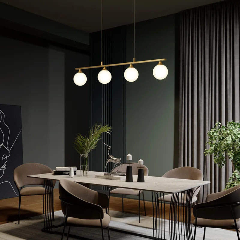 suspension lumineuse or blanc sphères translucides barre horizontale moderne minimaliste chambre salon