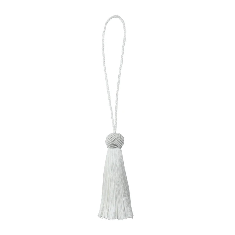 pompons franges decoration maison beige gris blanc bleu marine noir tissu élégant