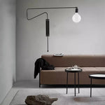 lampe murale articulée bras long noir doré moderne éclairage chambre minimaliste industrielle