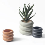 cache pot céramique moderne gris orange texture granuleuse fleur plante intérieure contemporain minimaliste