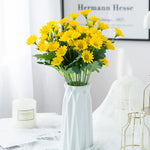 bouquet marguerites soie orange jaune rose blanc vase blanc moderne décoration intérieur mariage