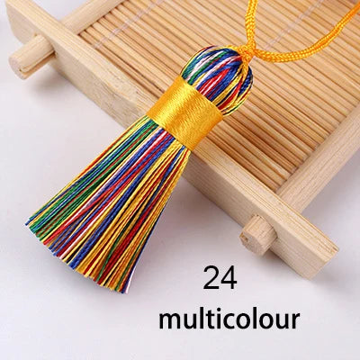 pompons soie polyester 5cm longueur 18cm corde noir rose rouge vert jaune bleu modernes