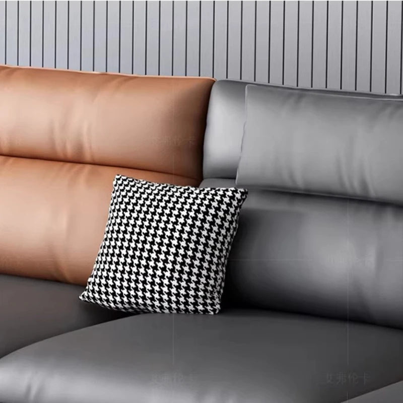 Canapé d'angle moderne cuir gris chaise lounge pieds noirs coussins géométriques salon bois composite