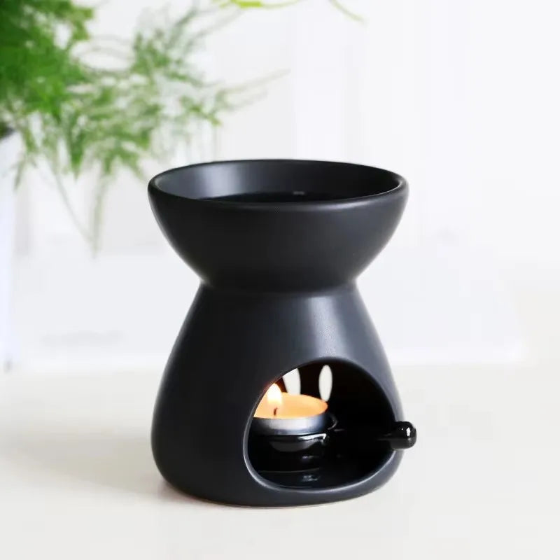 lampe huile essentielle céramique moderne noir blanc décoration feuilles étoiles ajourée diffuseur aromathérapie yoga