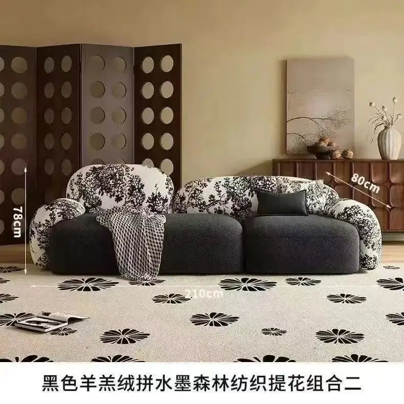 canapé moderne noir blanc fleurs motifs abstraits coussins plateau bois minimaliste italien scandinave