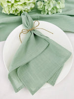 serviettes réutilisables coton vert clair blanc bleu clair vert foncé texture lin naturelle classique