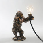 lampe poser moderne or noir ampoule led texture gorille animalier tringle câble noir