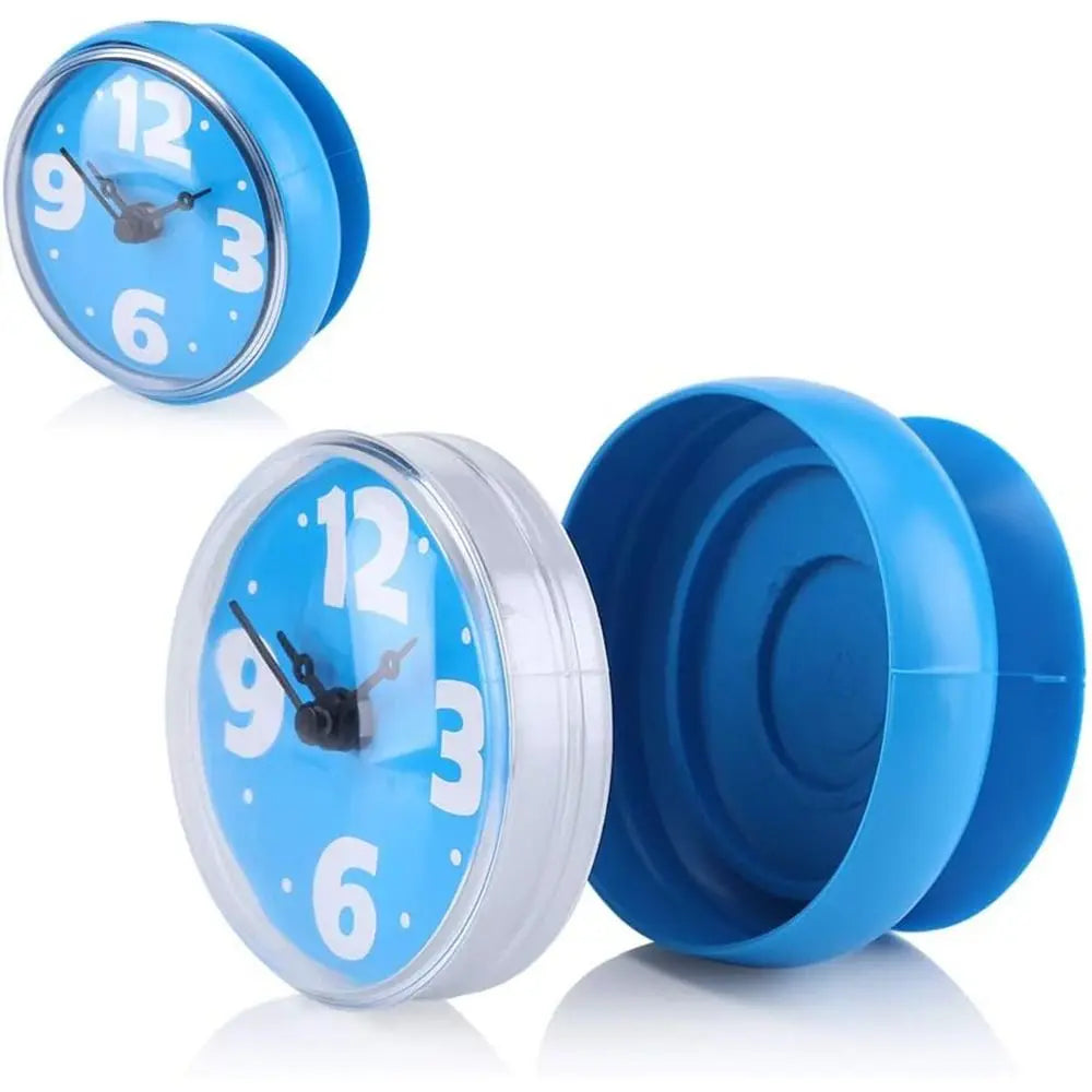 Horloge de douche verte compacte sur carrelage de salle de bain