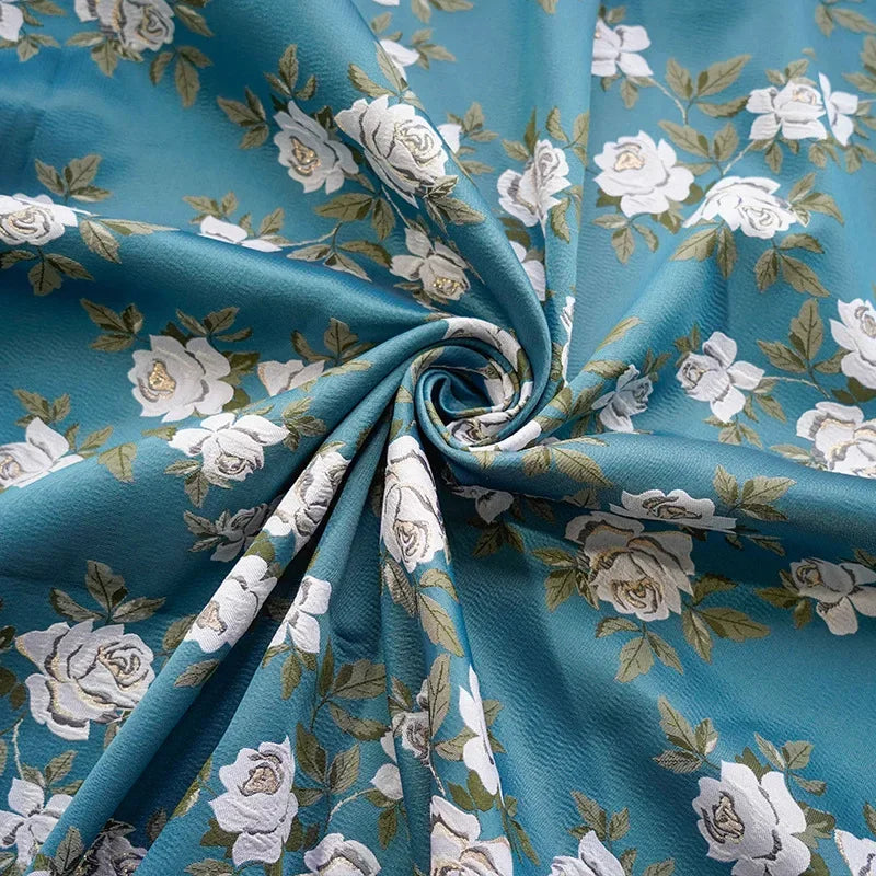 tissu textile floral bleu roses blanches motif olivine rideau decoratif texturé romantique
