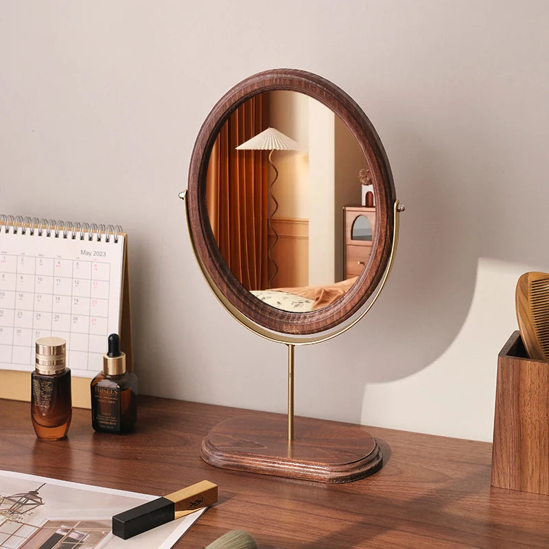 miroir table classique marron foncé texture bois miroir ovale tringle métallique dorée chambre salon