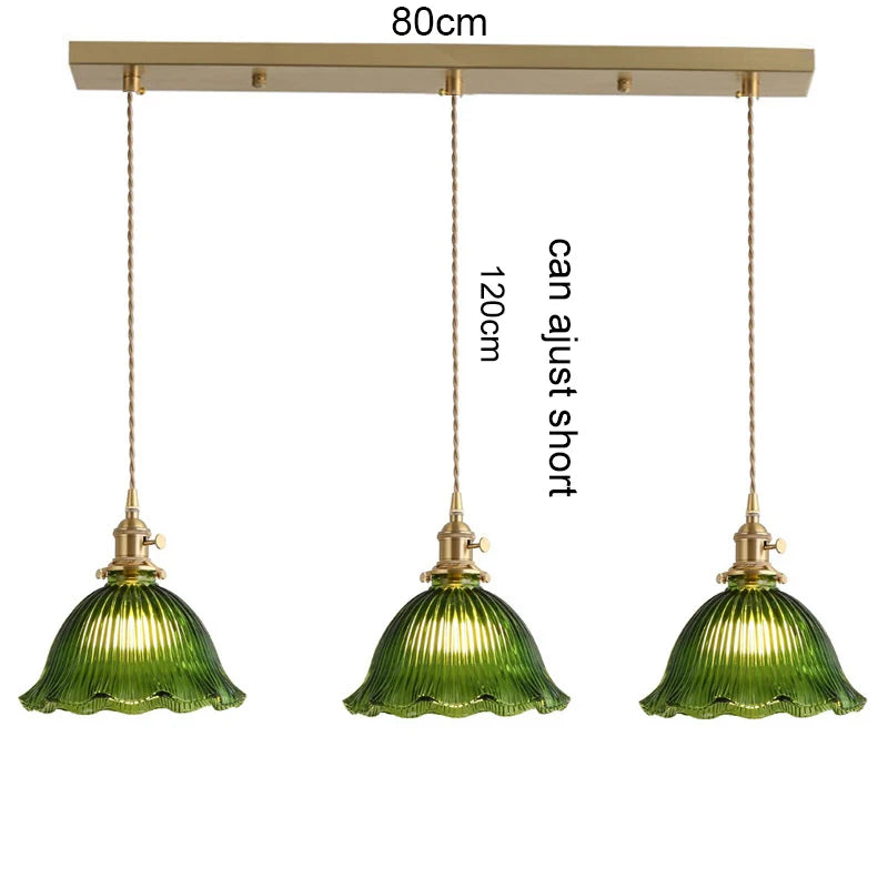 suspension lumineuse vintage vert doré motifs géométriques ampoules câbles chaînes métal