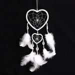 décoration murale attrape rêves plumes coquillages boho chic coeurs bleu rose violet