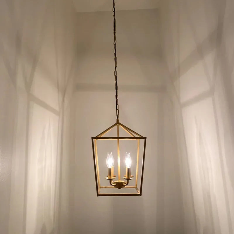 lampe suspendue or noir structure géométrique transparent moderne vintage
