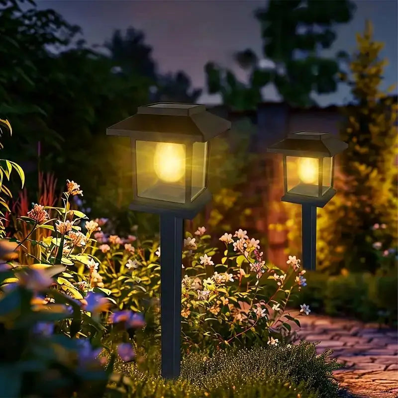 lampes solaires autonomes noires transparentes modernes jardin cheminées fixations piquets flux lumineux nocturne