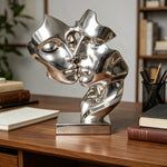 sculpture moderne deux visages enlacés blanc noir doré argenté minimaliste surface lisse socle
