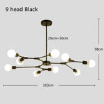 suspension lumineuse moderne or noir sphères translucides scandinave structure métallique pince suspension