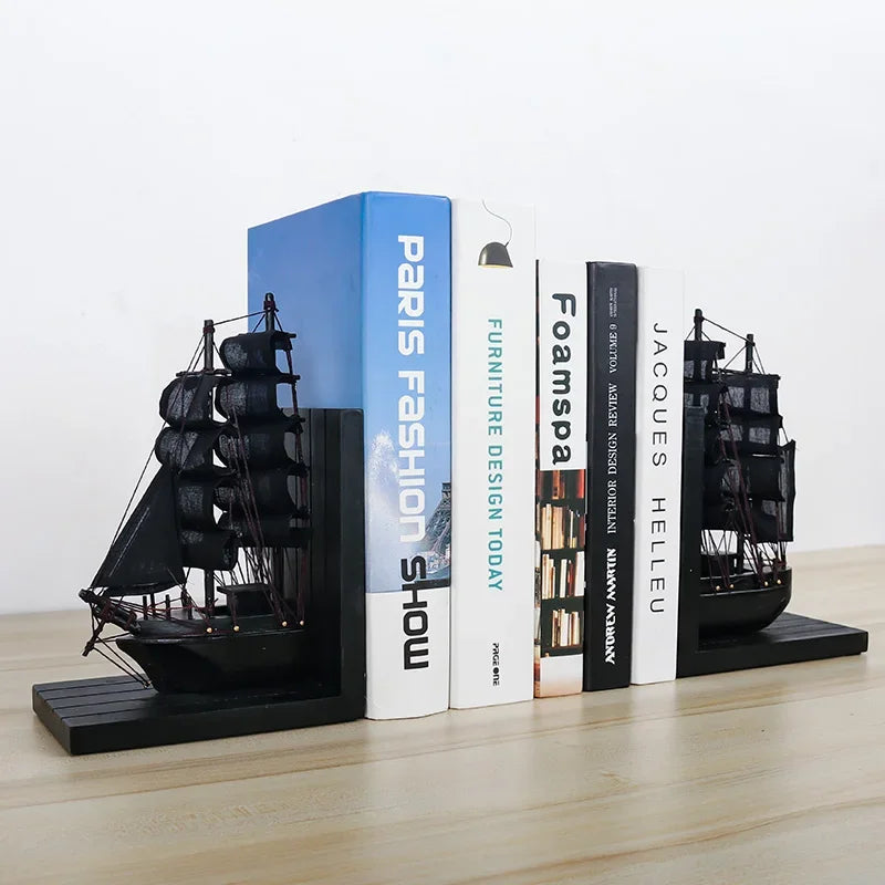 support livres bateau voiles transparentes clips dorés moderne décoratif noir blanc