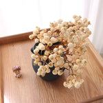 décoration intérieure bouquet artificiel feuilles baies rouge orange naturel rustique