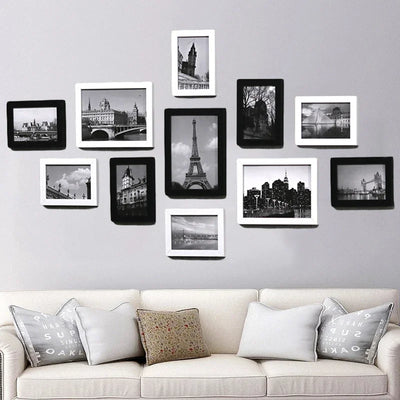 Ensemble de 11 cadres photo architecture moderne sur mur blanc