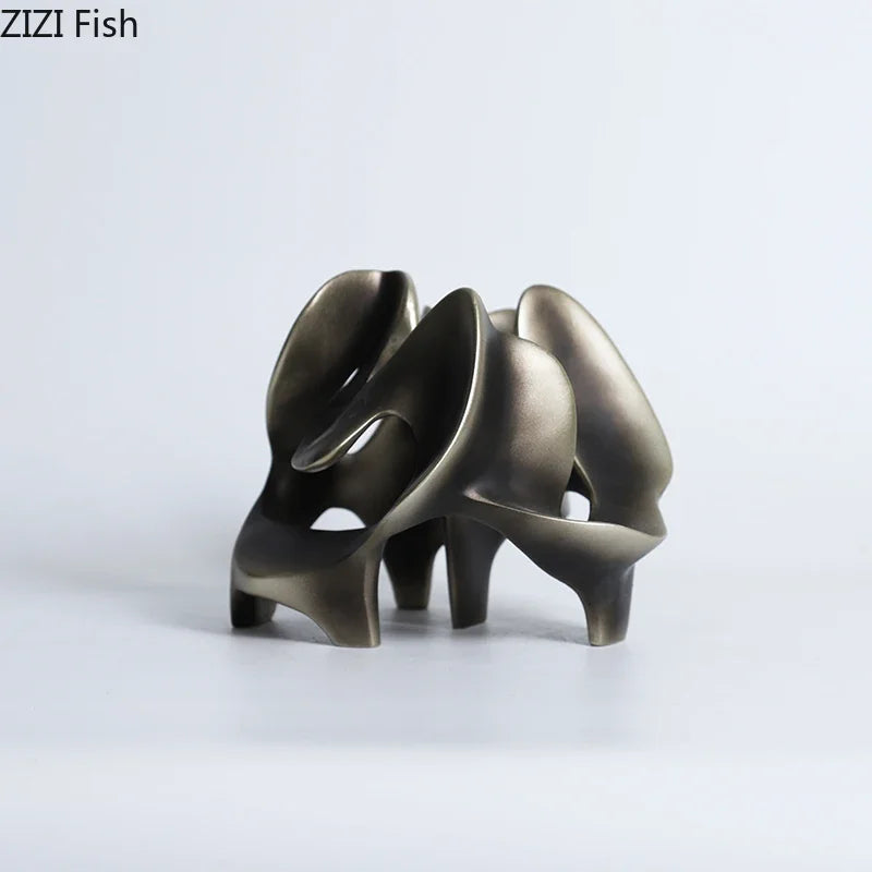 décoration moderne sculpture abstraite résine gris foncé bronze formes organiques surface lisse