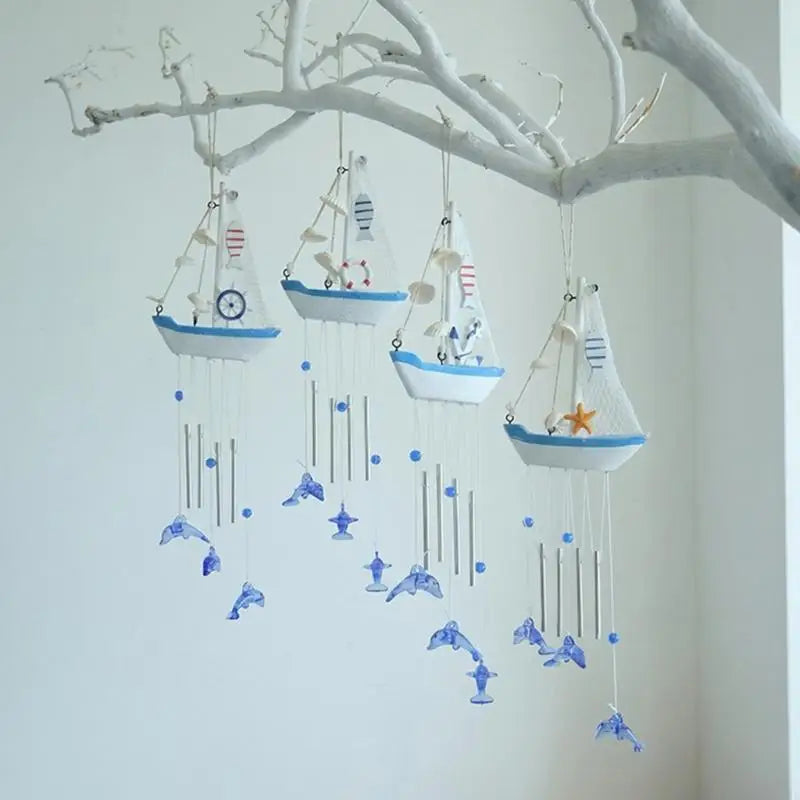 mobile mural thème marin bateaux dauphins élément nautiques blanc bleu beige modernes fixations