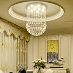 suspension lumineuse moderne cristal dorées élégante lumière led transparente fixations invisibles chambre salon
