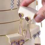 présentoir bijoux rotatif velours bois beige gris moderne clips removable supports individuels