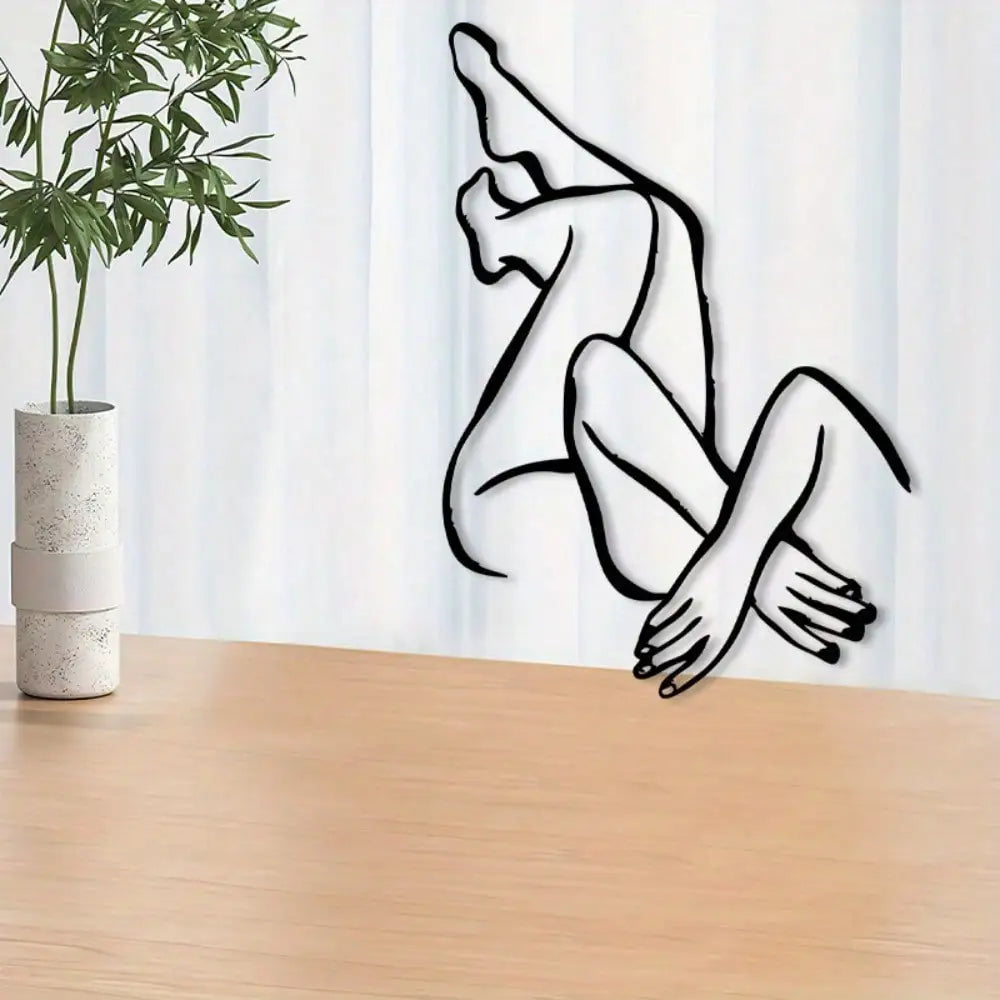 sculpture murale noir figure humaine abstraite contour simple contemporain chambre salon decoration