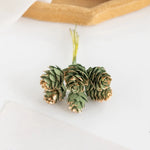 décoration festive cônes pin artificiels argenté doré rose pâle extérieur mariage noël
