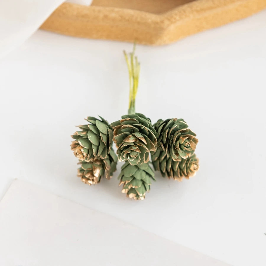 décoration festive cônes pin artificiels argenté doré rose pâle extérieur mariage noël