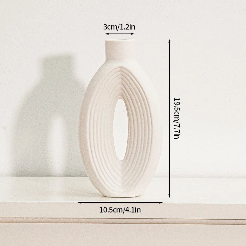 vases blancs modernes céramique rondes lignes horizontales décoration intérieure simple