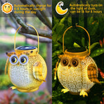 Lanterne solaire hibou suspendue dans un arbre