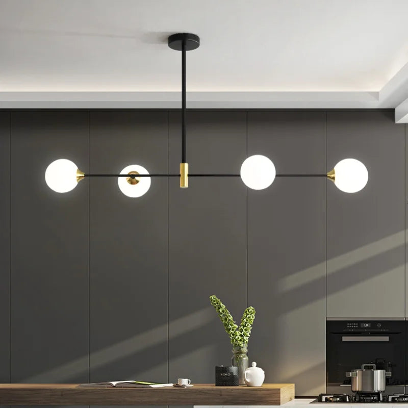 suspension lumineuse moderne minimaliste noir doré blanc sphères translucides métal poli
