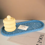 moule silicone assiettes ovales bleu beige vert violet rose texture granulée moderne minimaliste