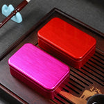 boîte thé métal or argent rose rouge noir lisse brillant moderne minimaliste imperméable