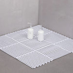 tapis salle bain blanc bleu turquoise vert gris jaune rose moderne minimaliste petits trous