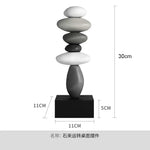 Sculpture moderne résine blanche gris noir lisse inspiration naturelle minimaliste base carrée noire