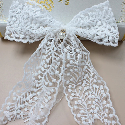 nœuds décoration rideau dentelle motif floral transparent romantique vintage blanc cassé éléments ruban