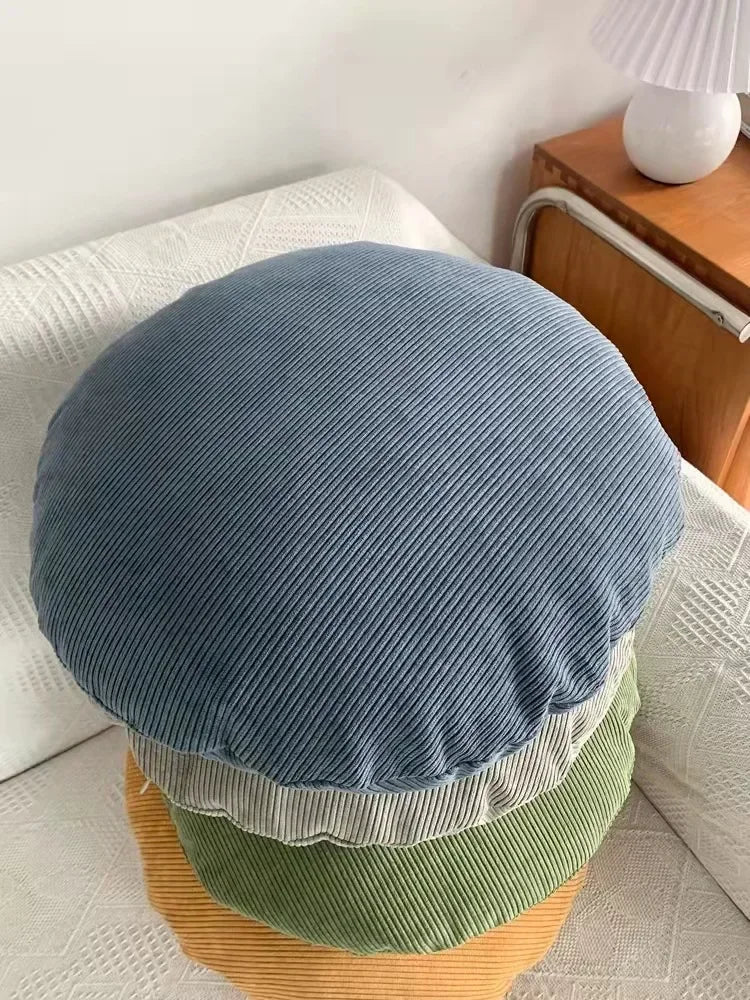housse coussin ronde velours côtelé rayures horizontales décoration canapé salon moderne rose pâle