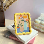 Cadre photo decoratif moderne motifs floraux bord ondules couleur rose jaune vert rouge orange
