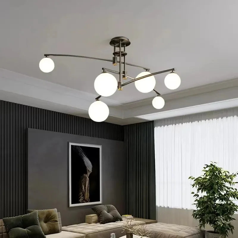 luminaire suspension moderne sphères translucides structure métallique dorée éclairage salon salle manger chambre