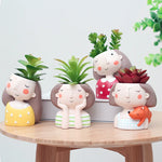 figurines décoratives cartoon fleurs reliefs cheveux stylisés plante succulente verte rose beige