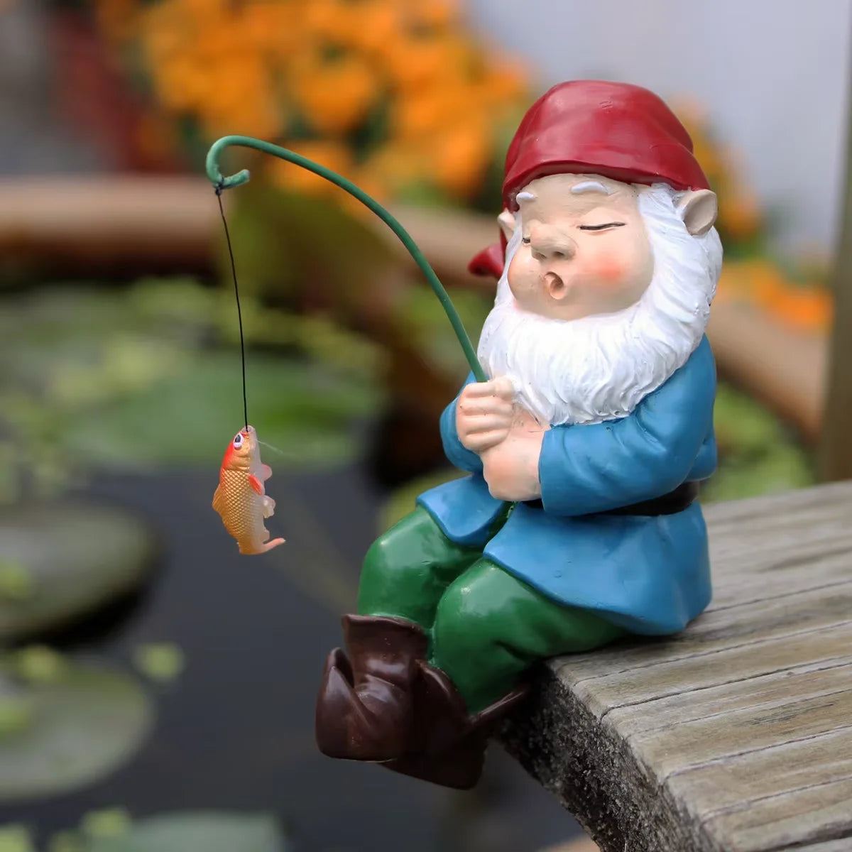 statuette lutin pêcheur résine verte bleu blanc rouge poisson canne pêche décoration jardin