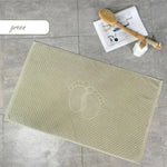 tapis bain coton absorbant motif pieds moderne vert clair gris bleu clair
