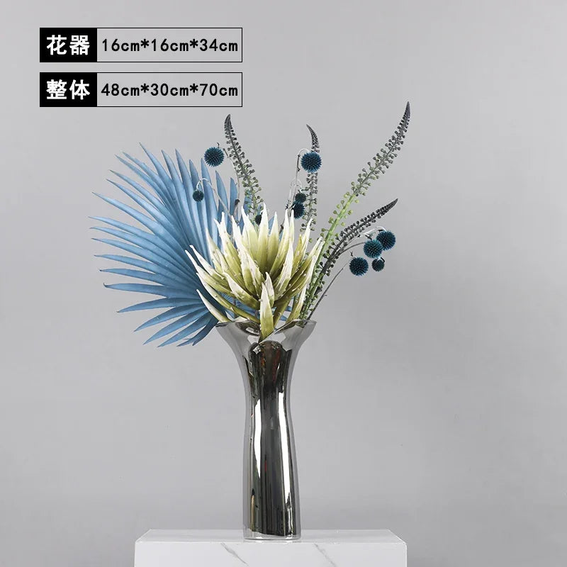 vase moderne argenté brillant fleurs artificielles blanches vertes décoration maison